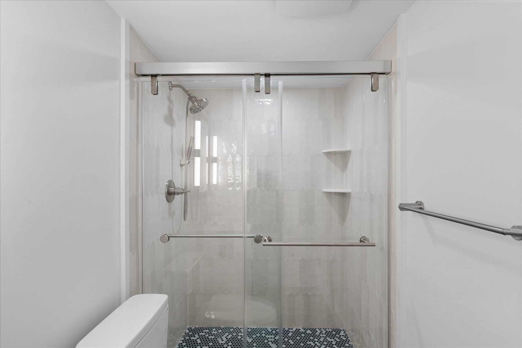 Custom and contemporary walk-in shower.
