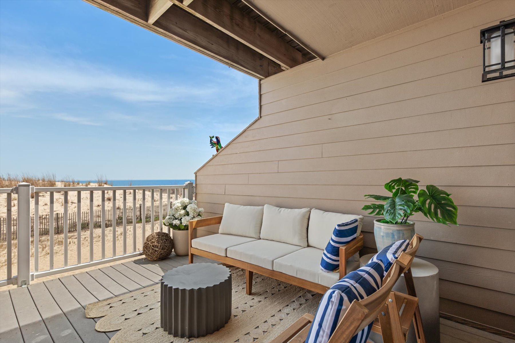 Oceanfront balcony with sweeping views and sea breeze