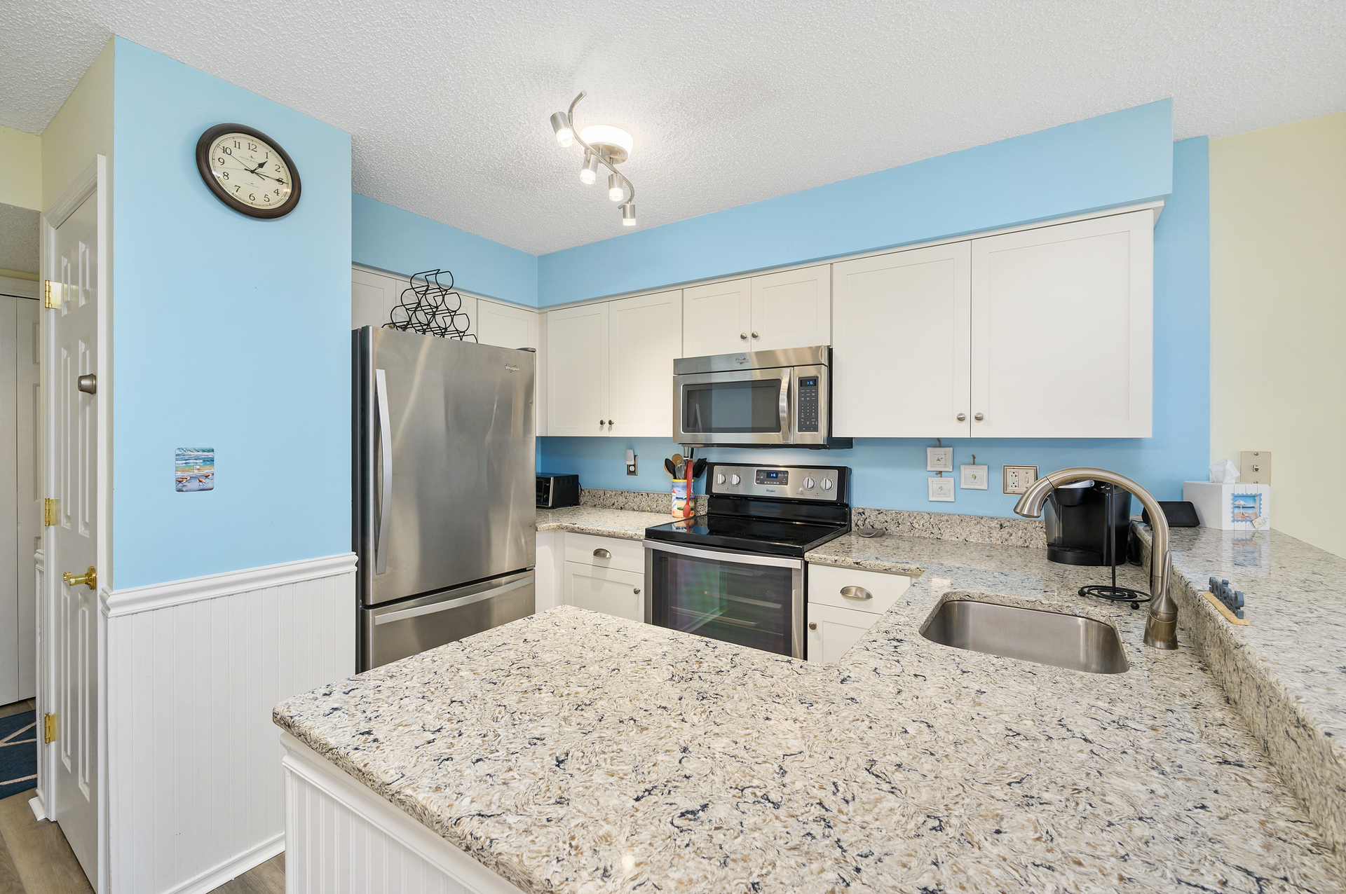 Beautiful, bright white cabinetry and an ample amount of counter space!