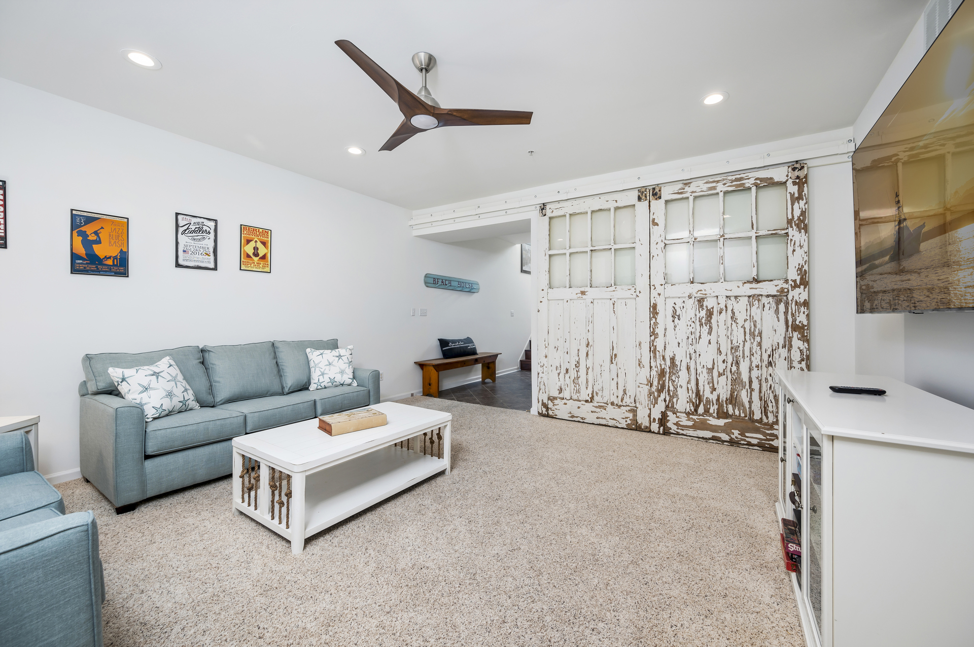 These beautiful rustic Barn doors close to provide privacy to the lower level