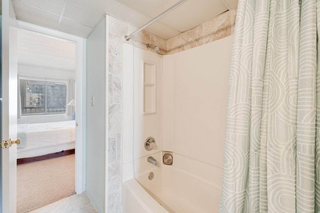 This full bath features a Shower/Tub Combo.