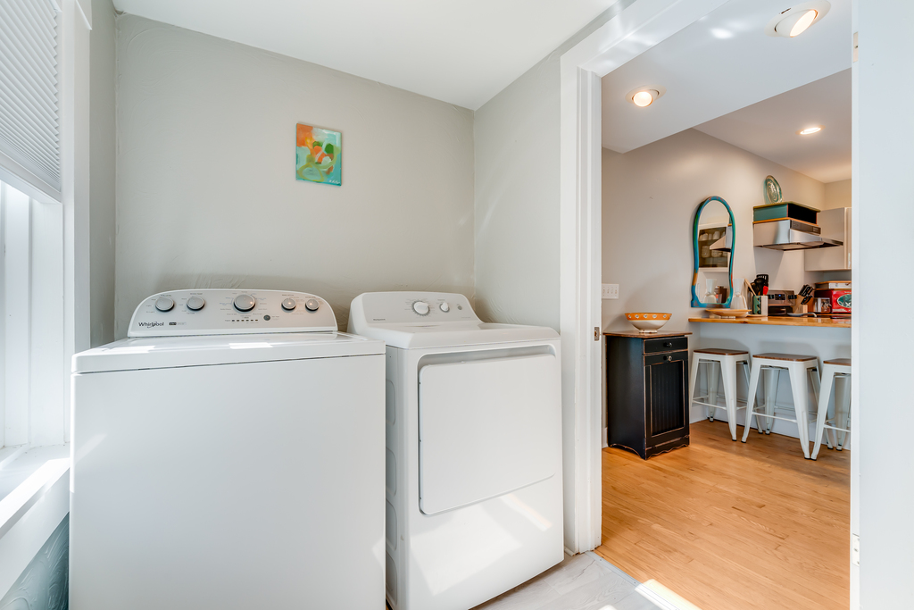 Half Bath also houses Full Size Washer and Dryer.