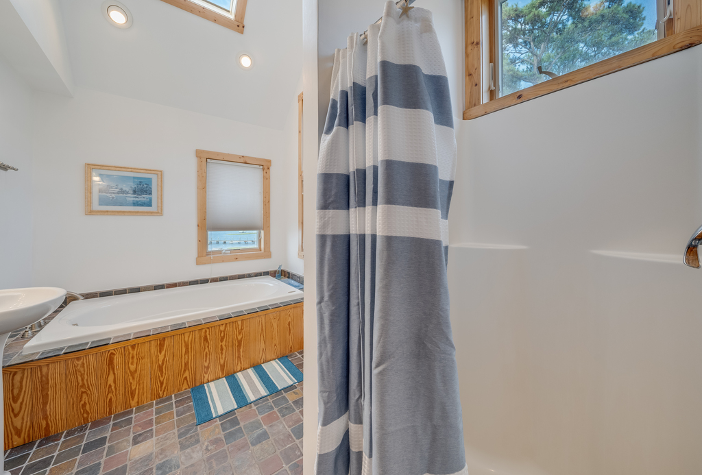 En-Suite Full Bath 2 is attached to Bedroom 3, which has a King Bed.