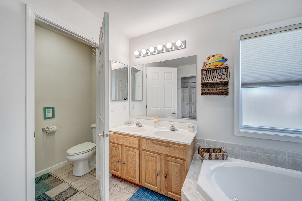 Double Vanity and Private Water Closet.