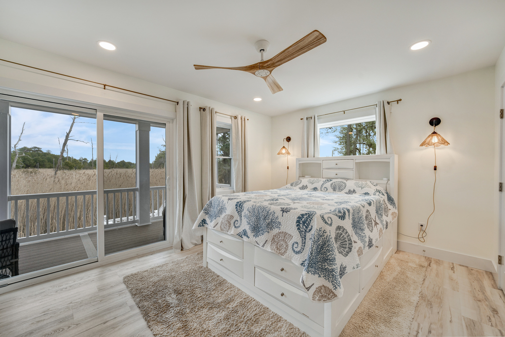 Bedroom 1 is the Primary Bedroom and has a Queen Bed and Private Access to the Water View Balcony!