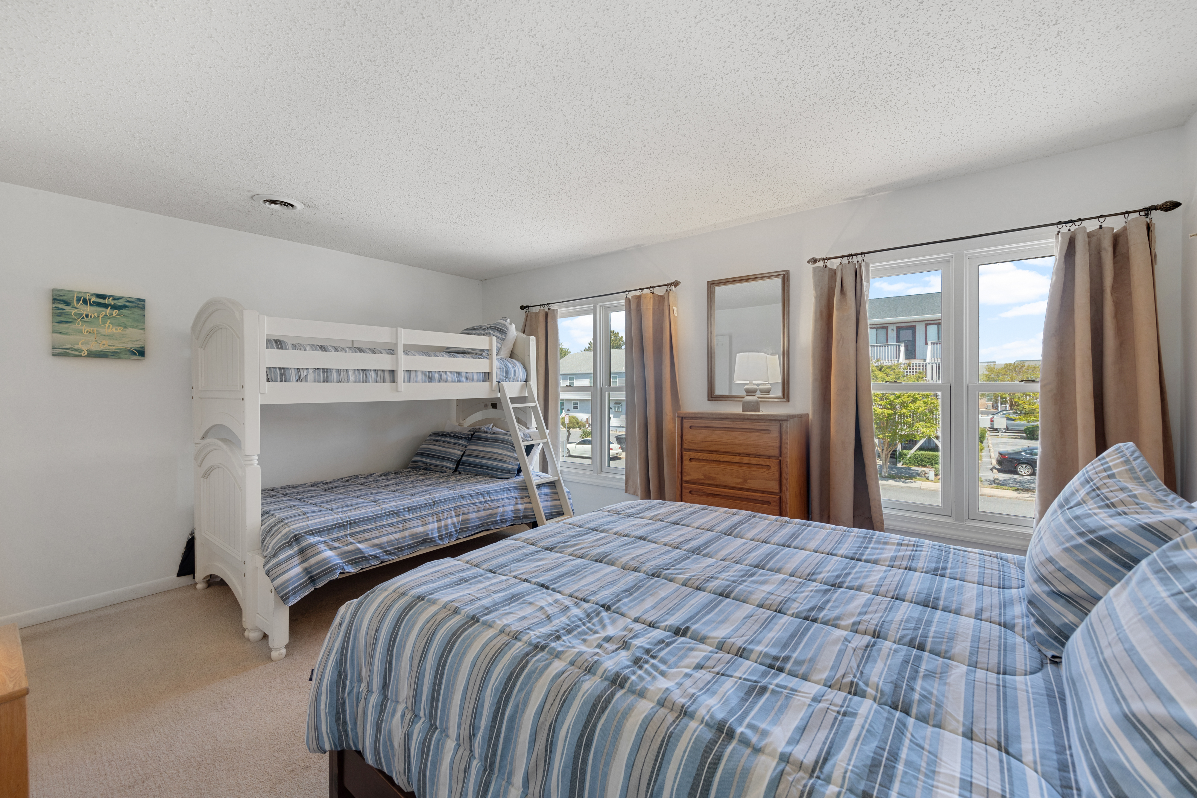 With a Plush Queen bed and a Pyramid Bunk (Twin over Full)