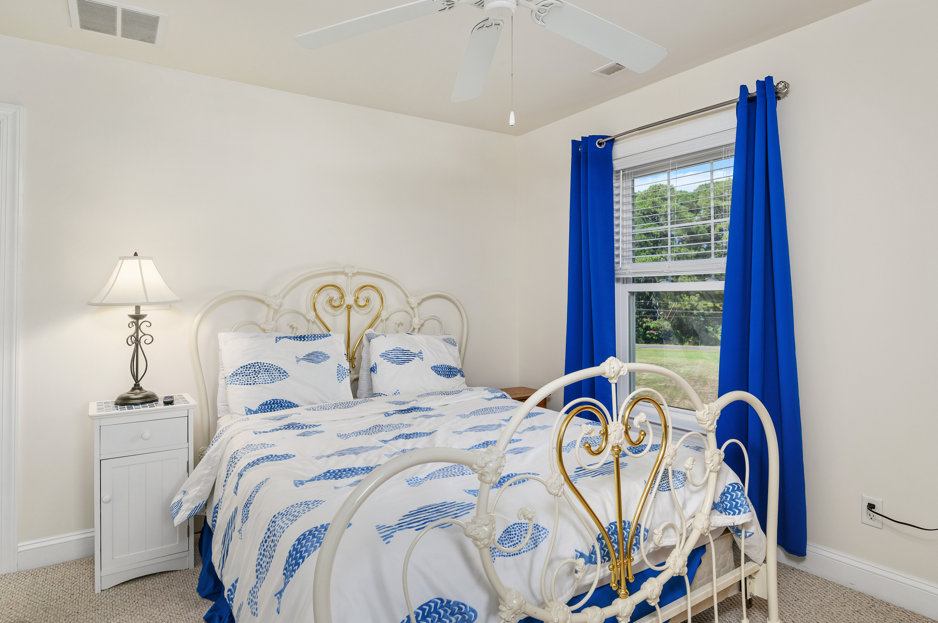 Bedroom 2 has a Queen Bed and Flat Screen TV.