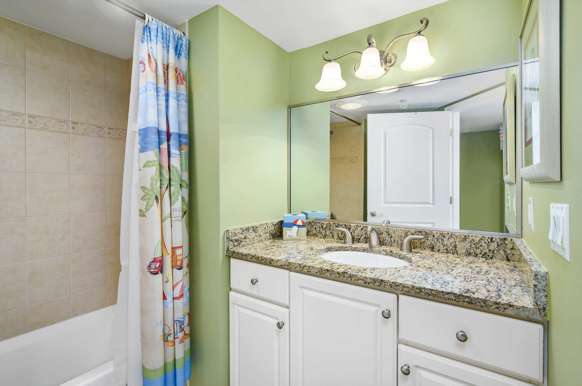 Shared full bathroom with shower/tub combo!