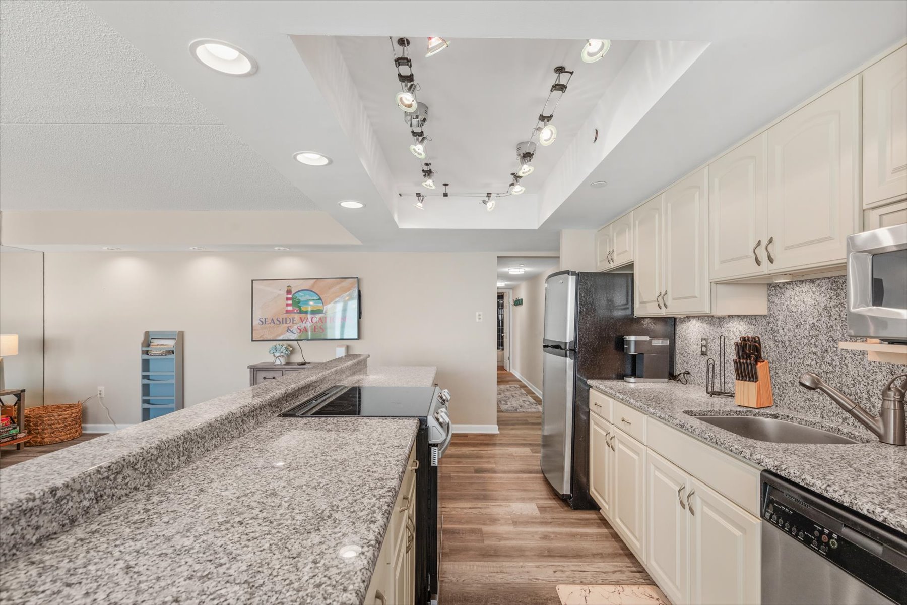 A spacious and clean layout offers ample cabinet storage and wide countertops to handle all your vacation cooking needs.