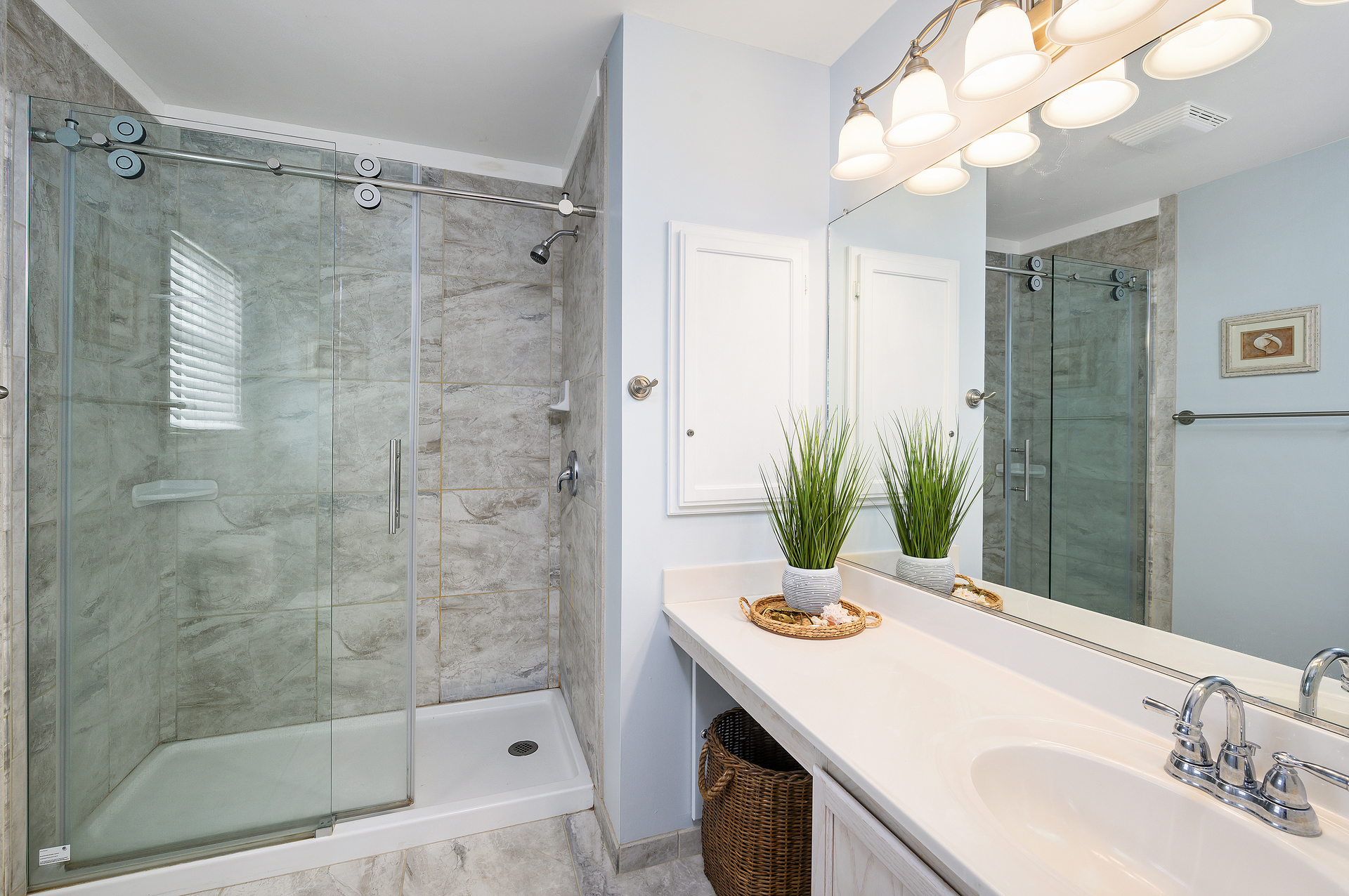 The spacious Primary Bathroom has a walk-in shower