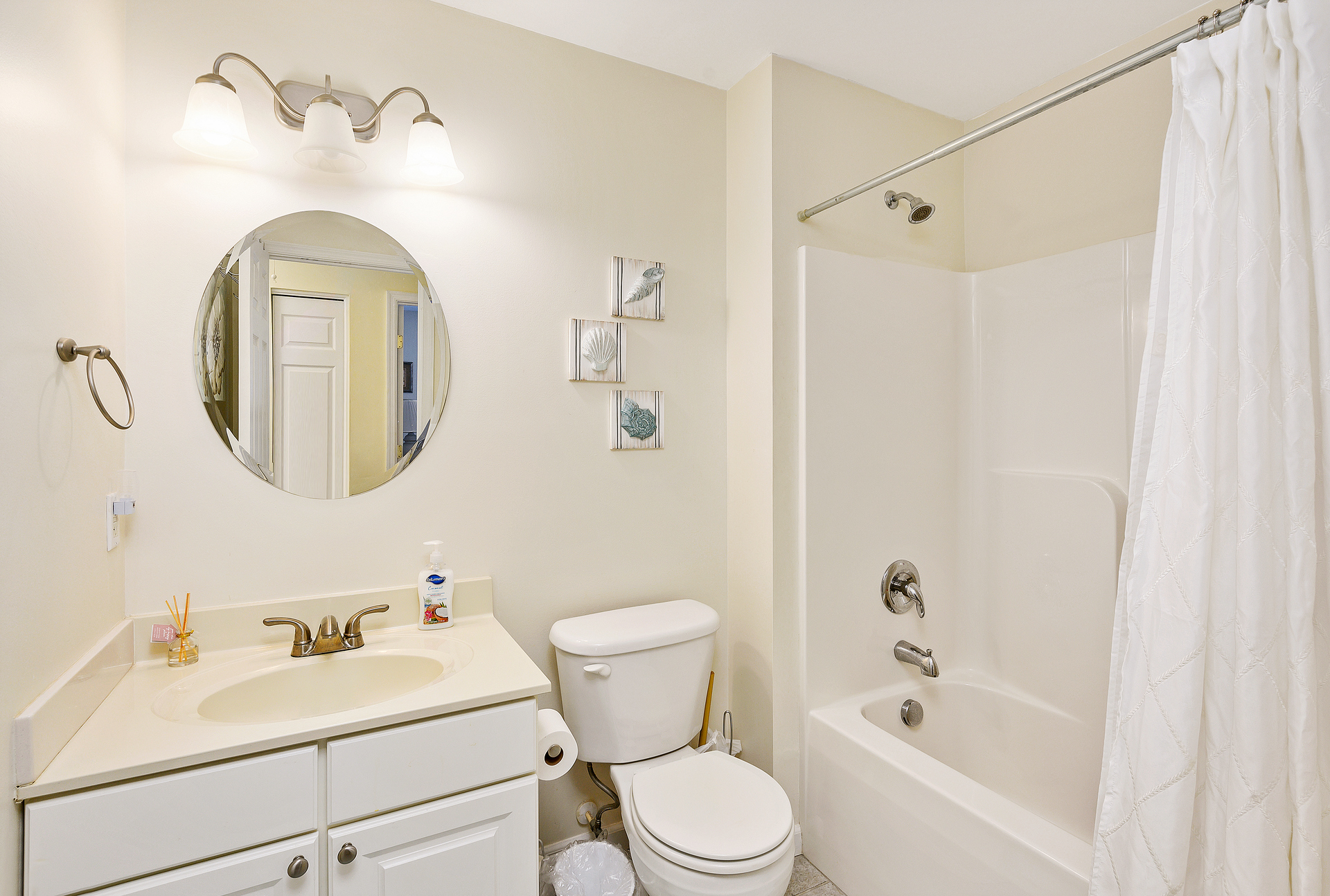 Full Bath in Hall with Tub/Shower Combo.
