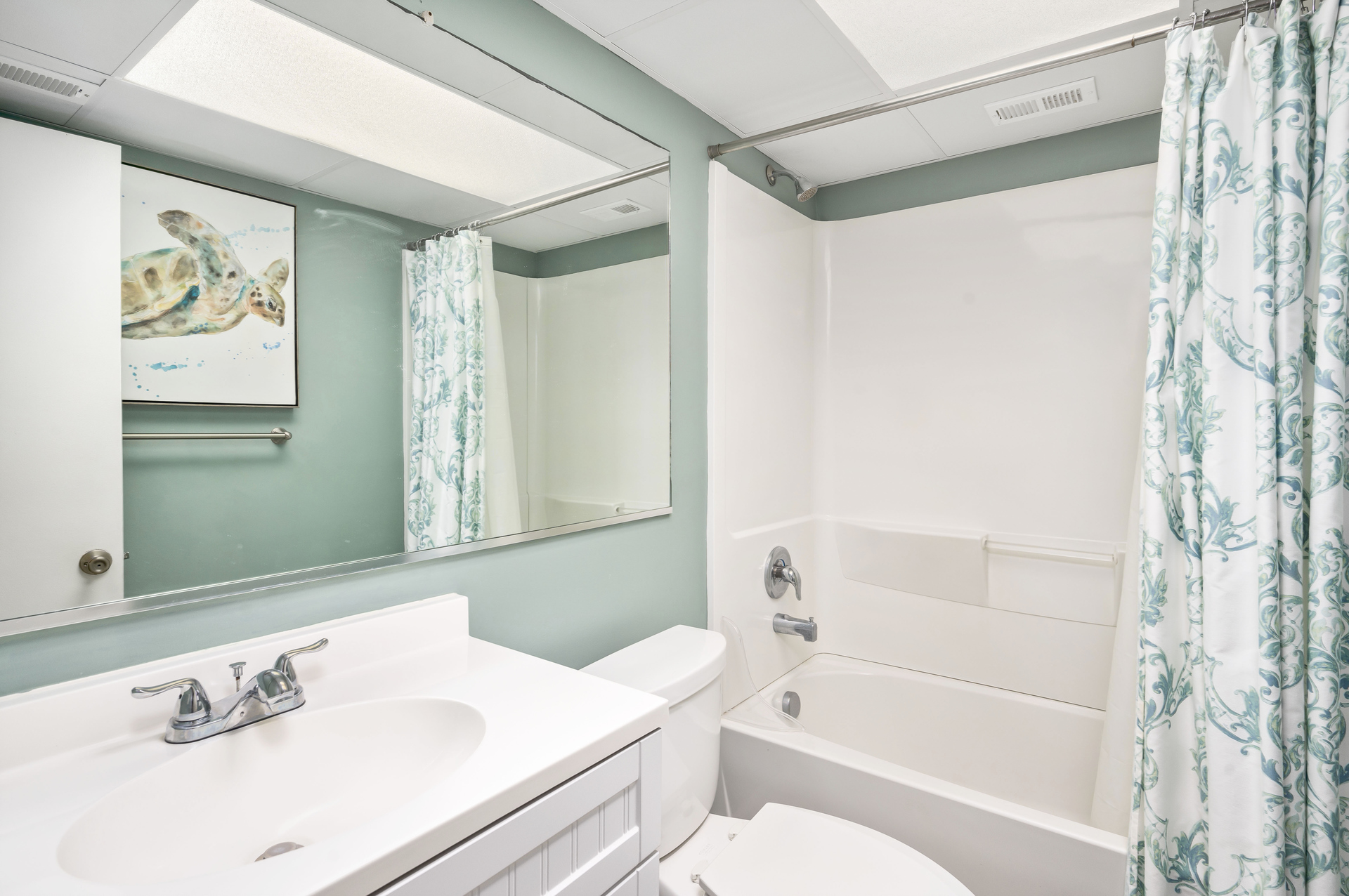 Shared Full Bath with Shower/Tub Combo.