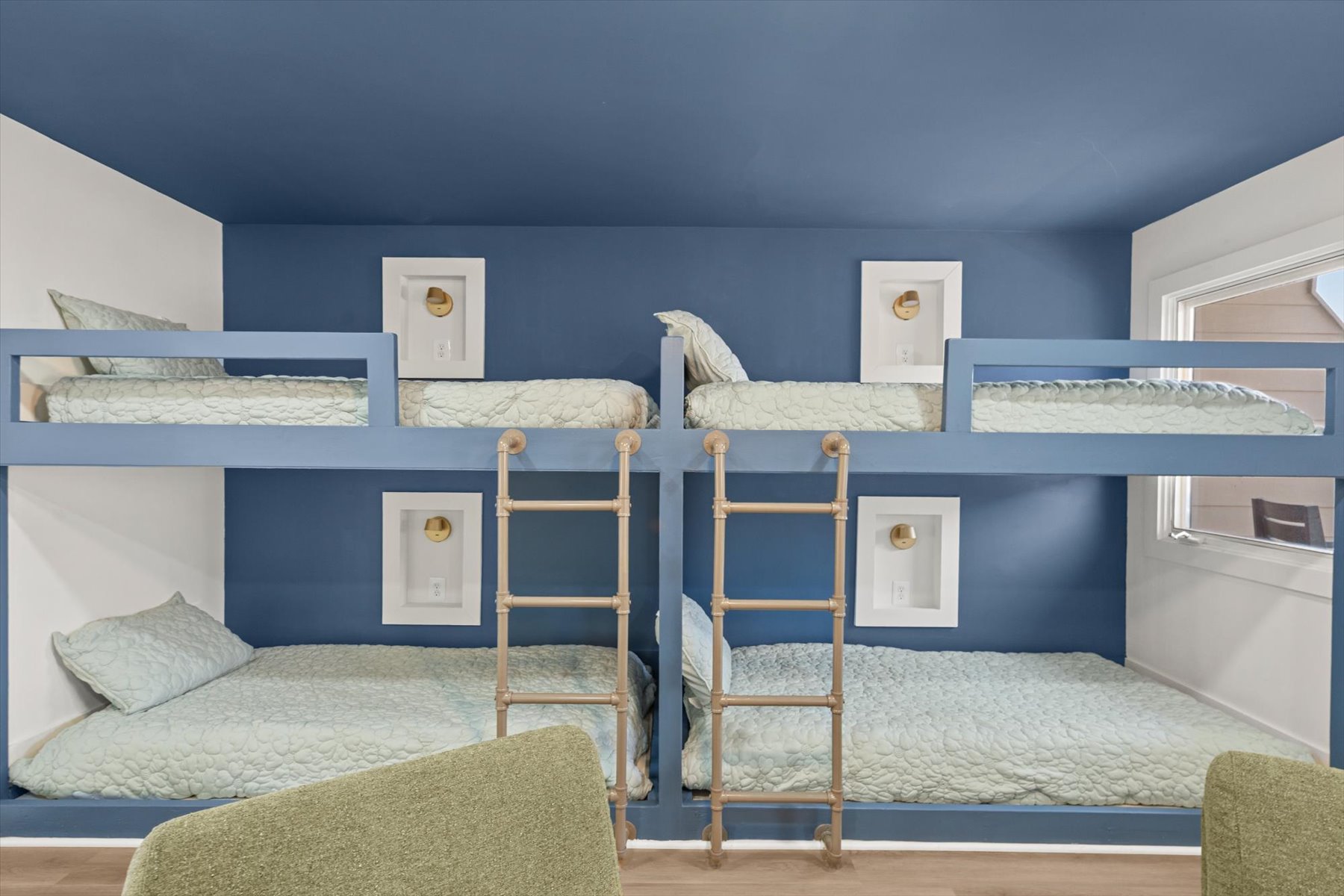 This bedroom will sleep 4 with custom built bunk beds.