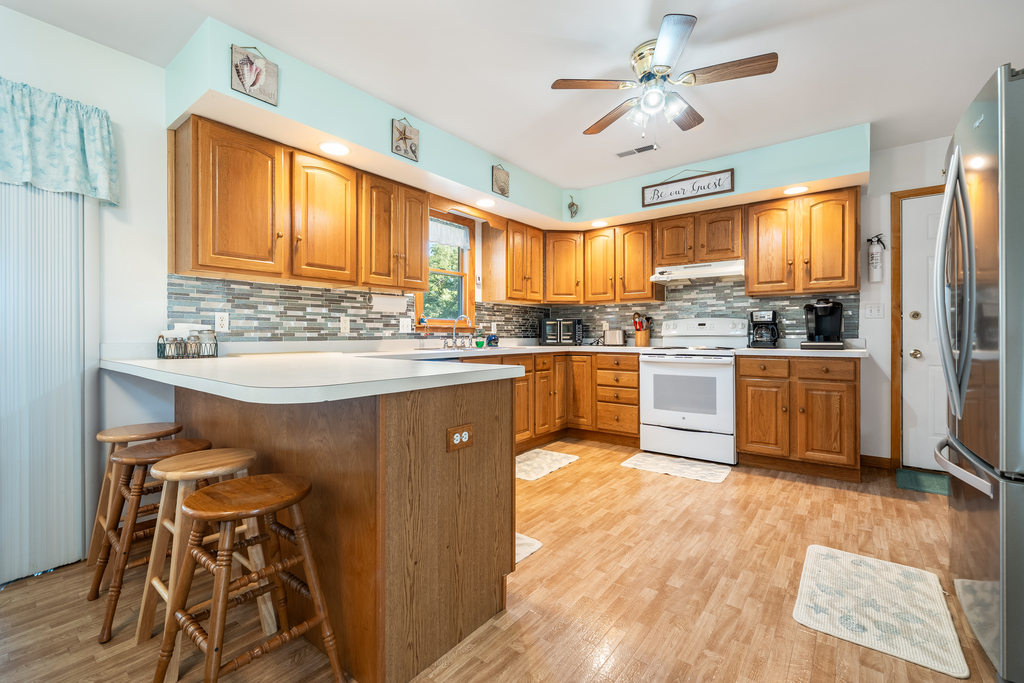Tons of Counter Space and Warm Wood Cabinetry.