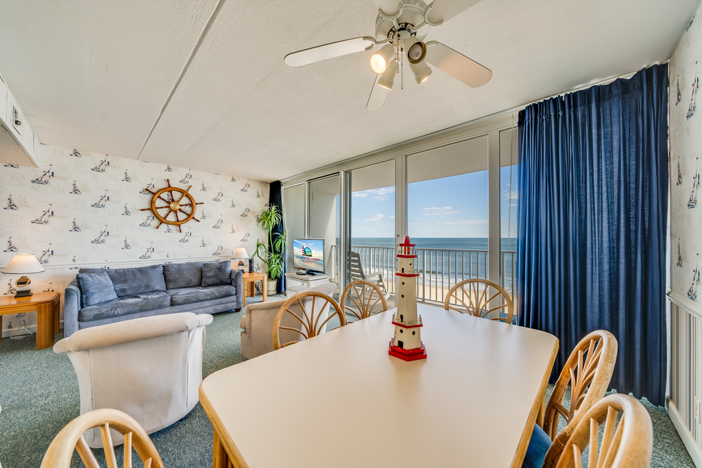 Enjoy the Sunrise from a comfy chair or glide outside to breathe in the Salty Air!