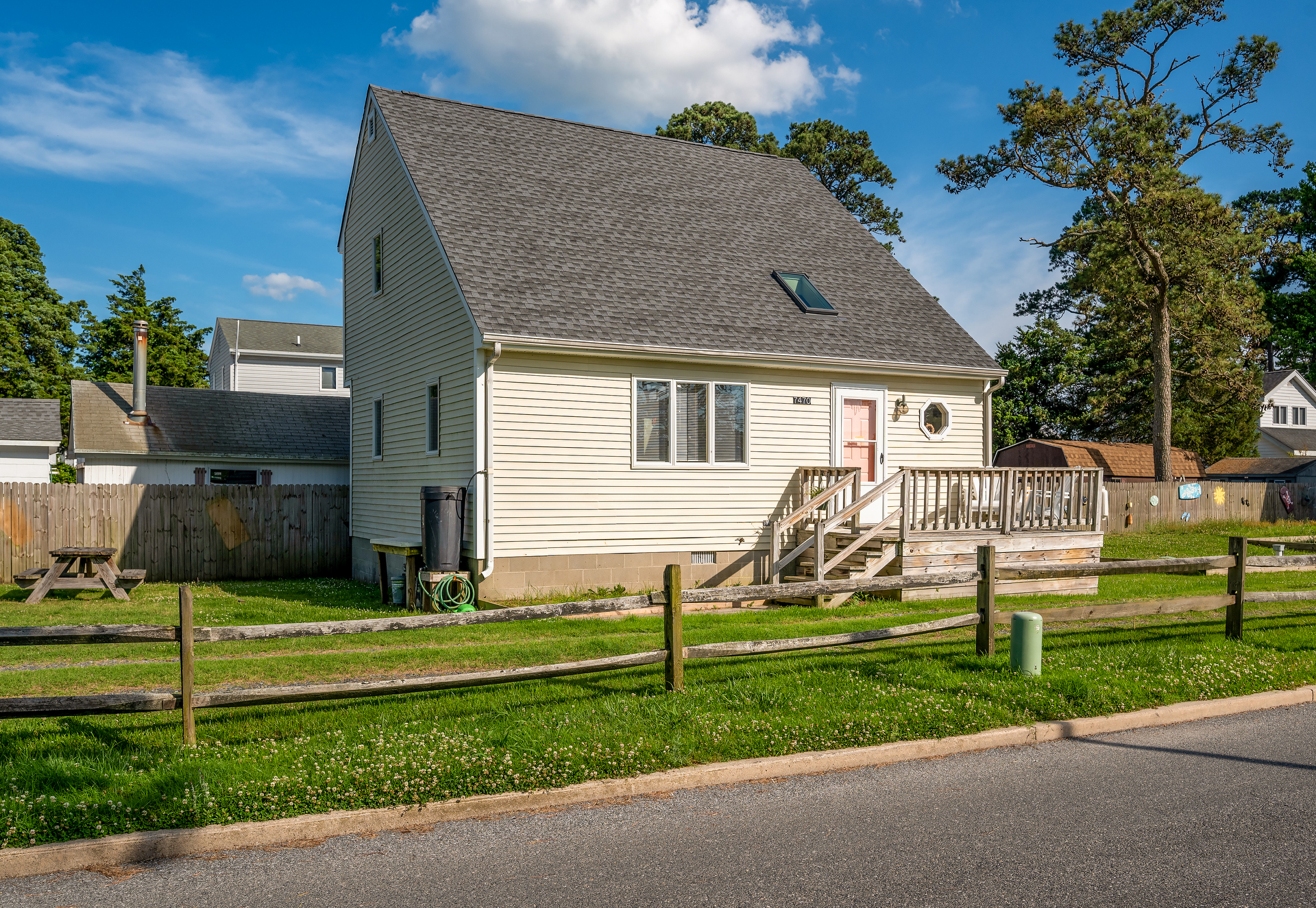 Watch the kids enjoy the Playground right from the Deck!