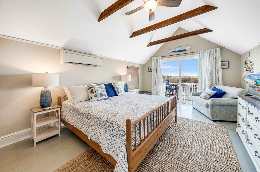 Master Bedroom upstairs has a King Bed and Sitting Area - and more breathtaking Views.