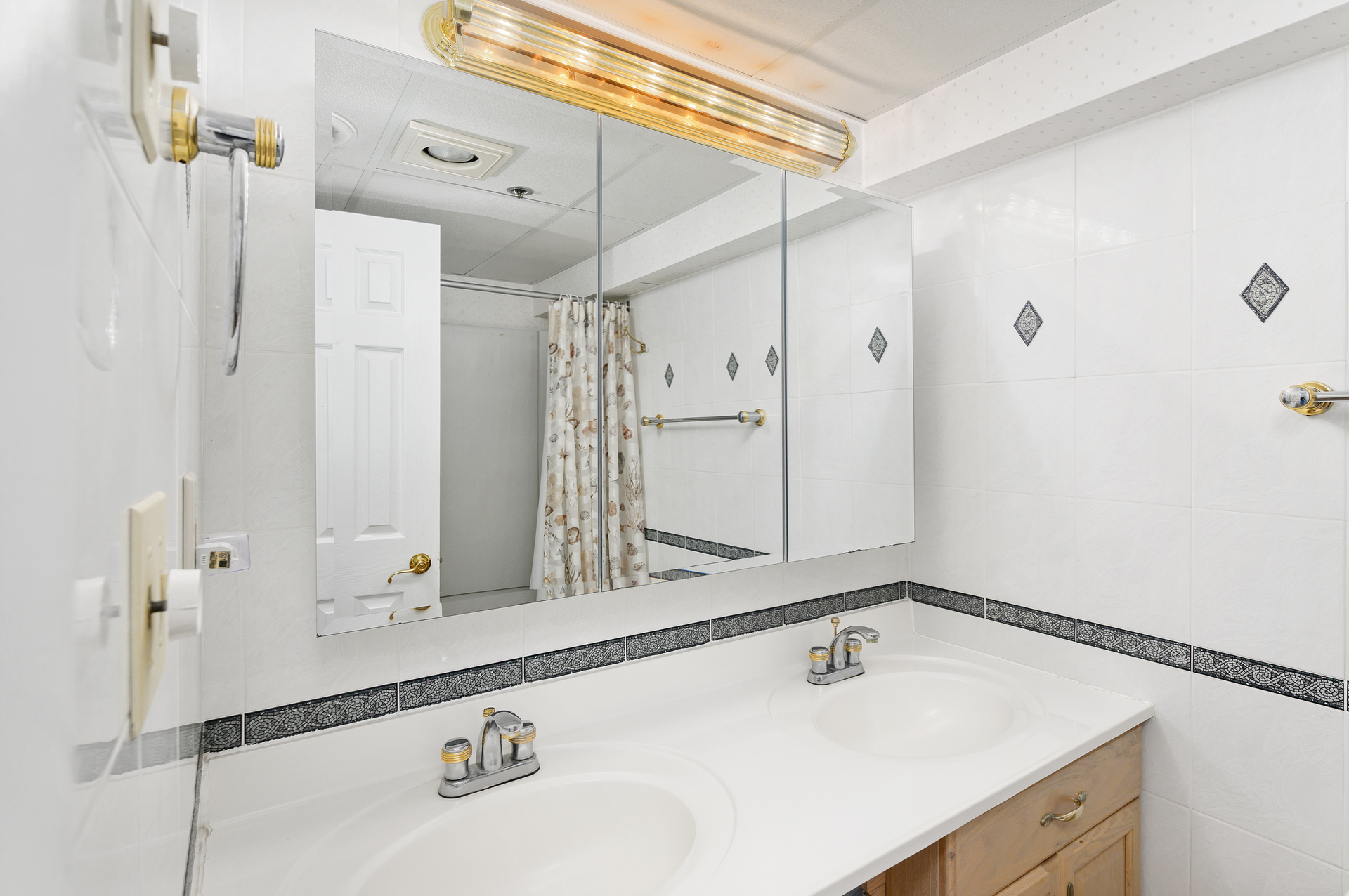 The Shared Hall Bath also has a Double Vanity