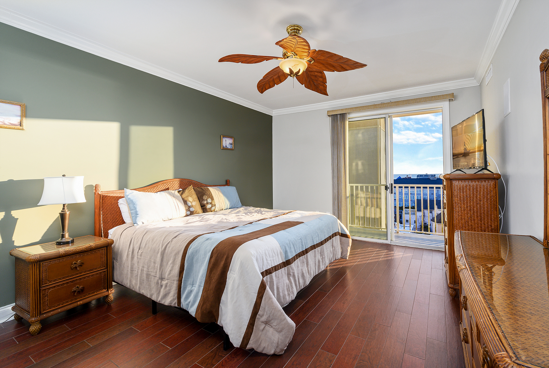 Bedroom 1 has access to the Private Balcony