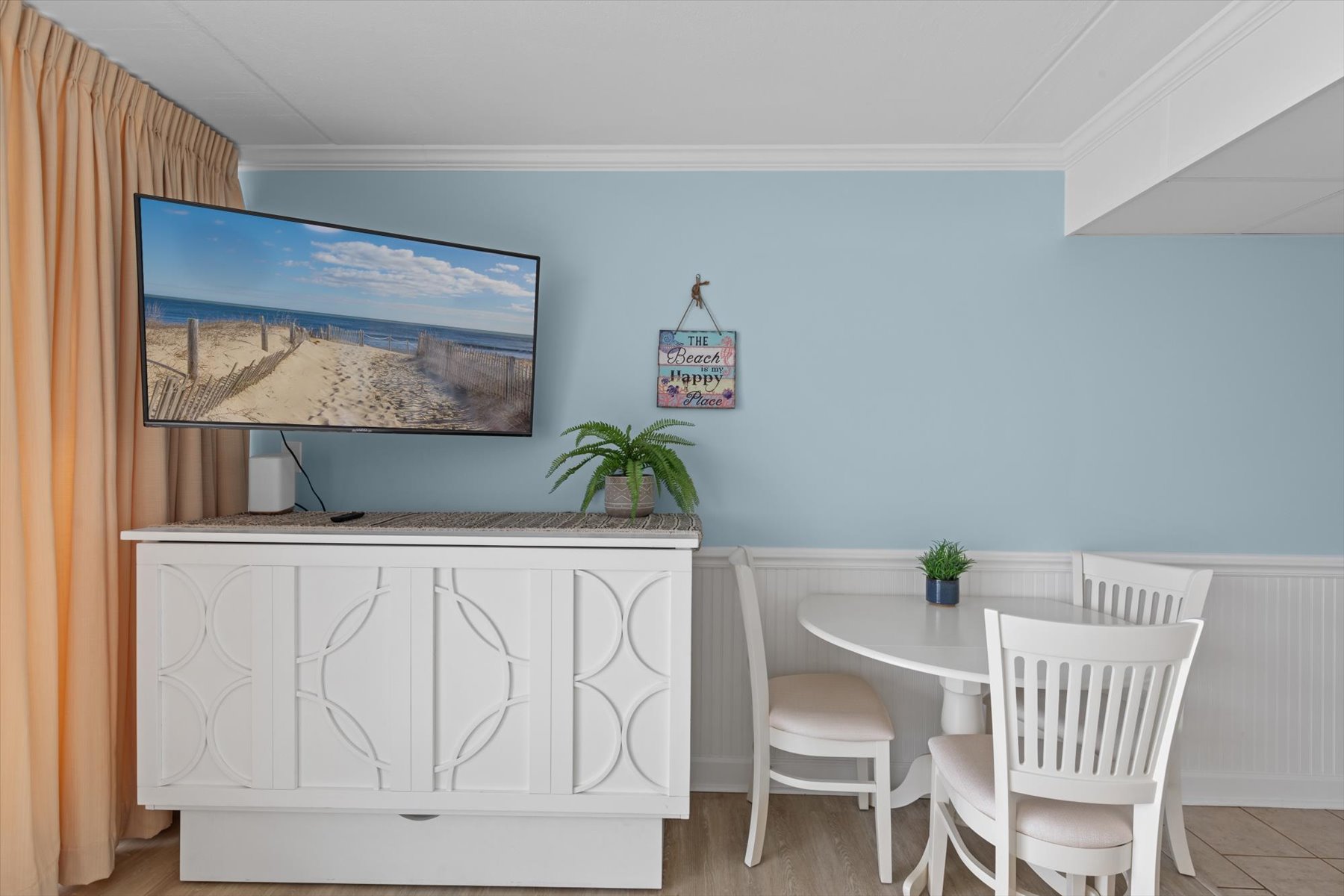 The entertainment cabinet is also a unique Murphy Bed providing additional sleeping