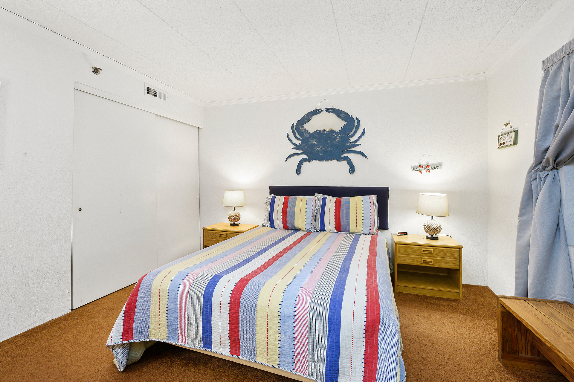 Bedroom 2 has a Queen bed.