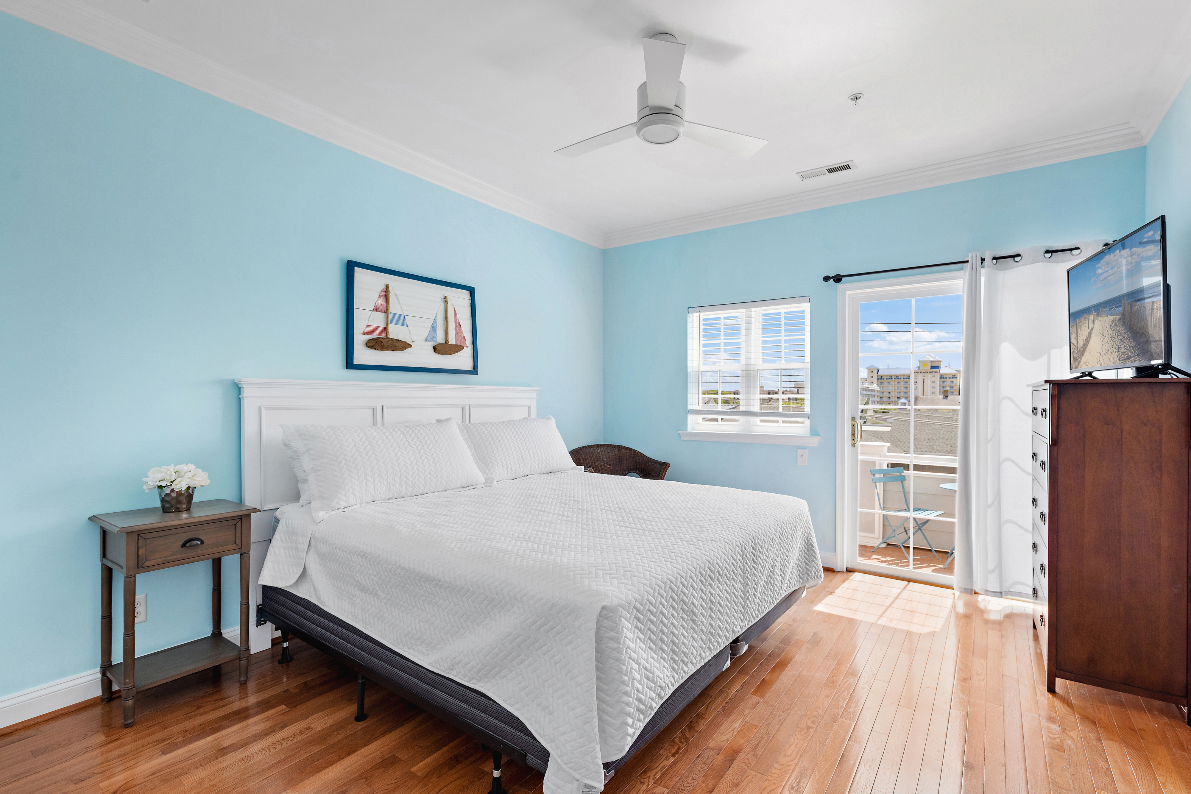 The Primary Bedroom has a luxurious King Bed and Flat Screen TV!