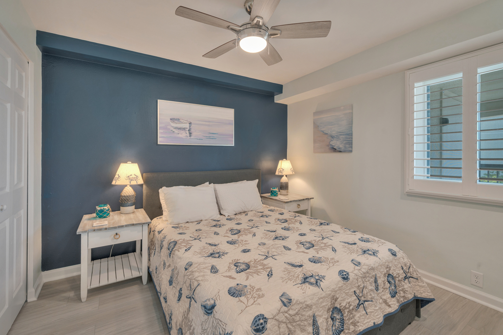 Bedroom 2 is tastefully decorated with Beachy Blue Furnishings!