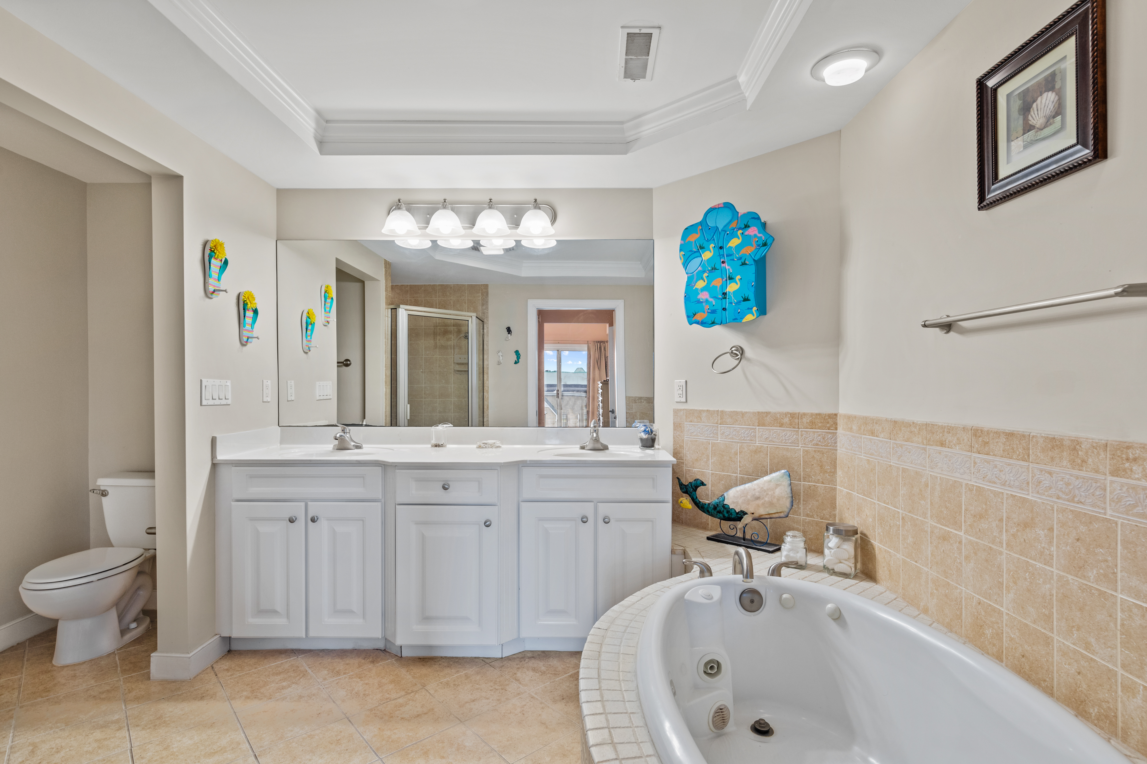 Featuring a Double Vanity and Spacious Walk-In Shower.