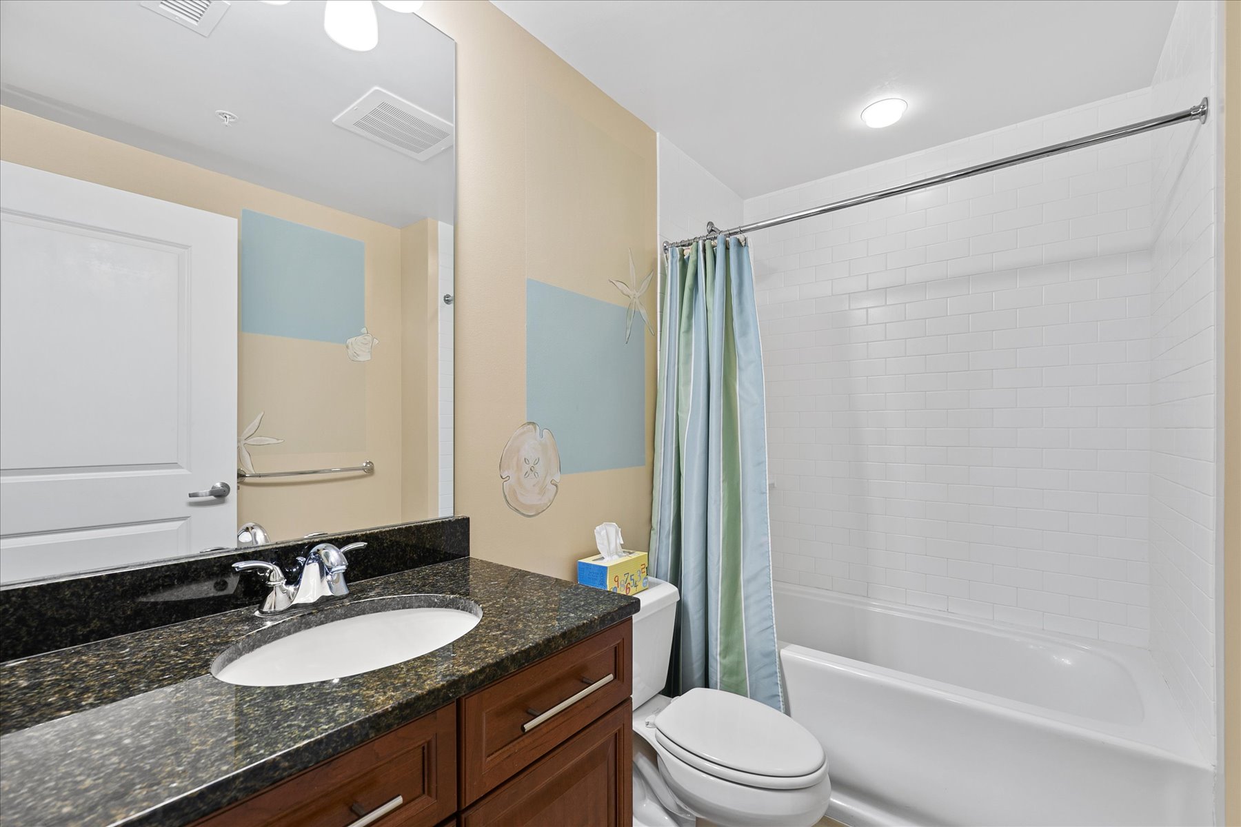 This Bathroom, connected to Bedroom 2, offers a Shower/Tub Combo.