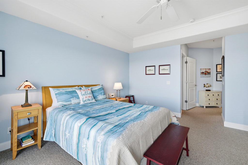 Colors of sea glass and coastal bedding promise a serene retreat.