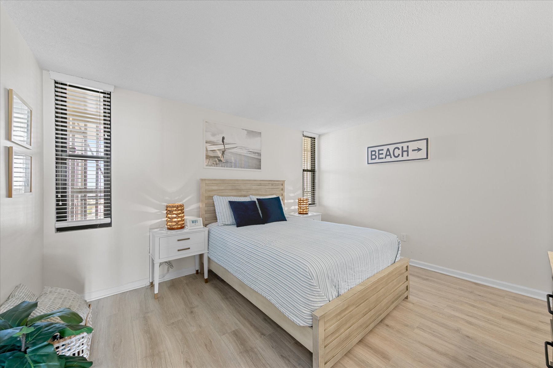 The Bedroom features a Cozy Queen Bed.