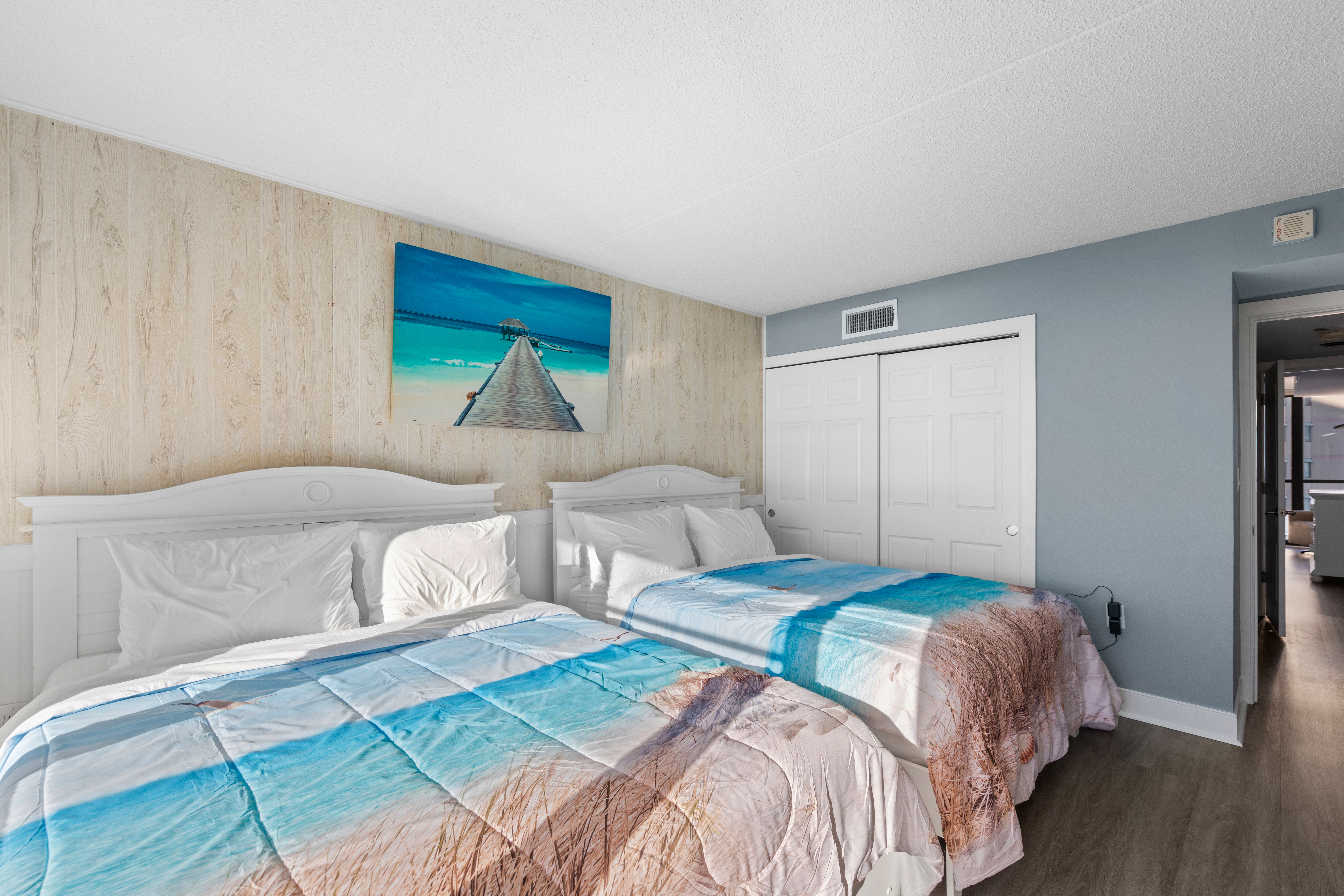 Slip away into dreamland in the plush Queen Beds!