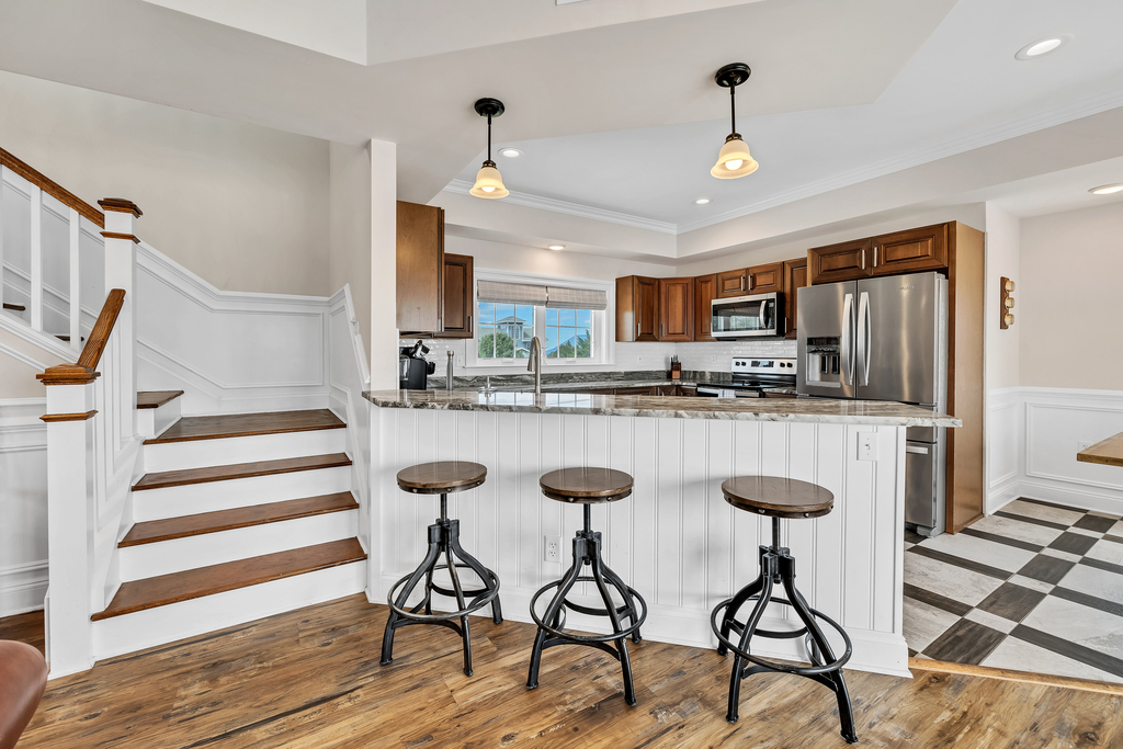 Gourmet Kitchen with Breakfast Bar.