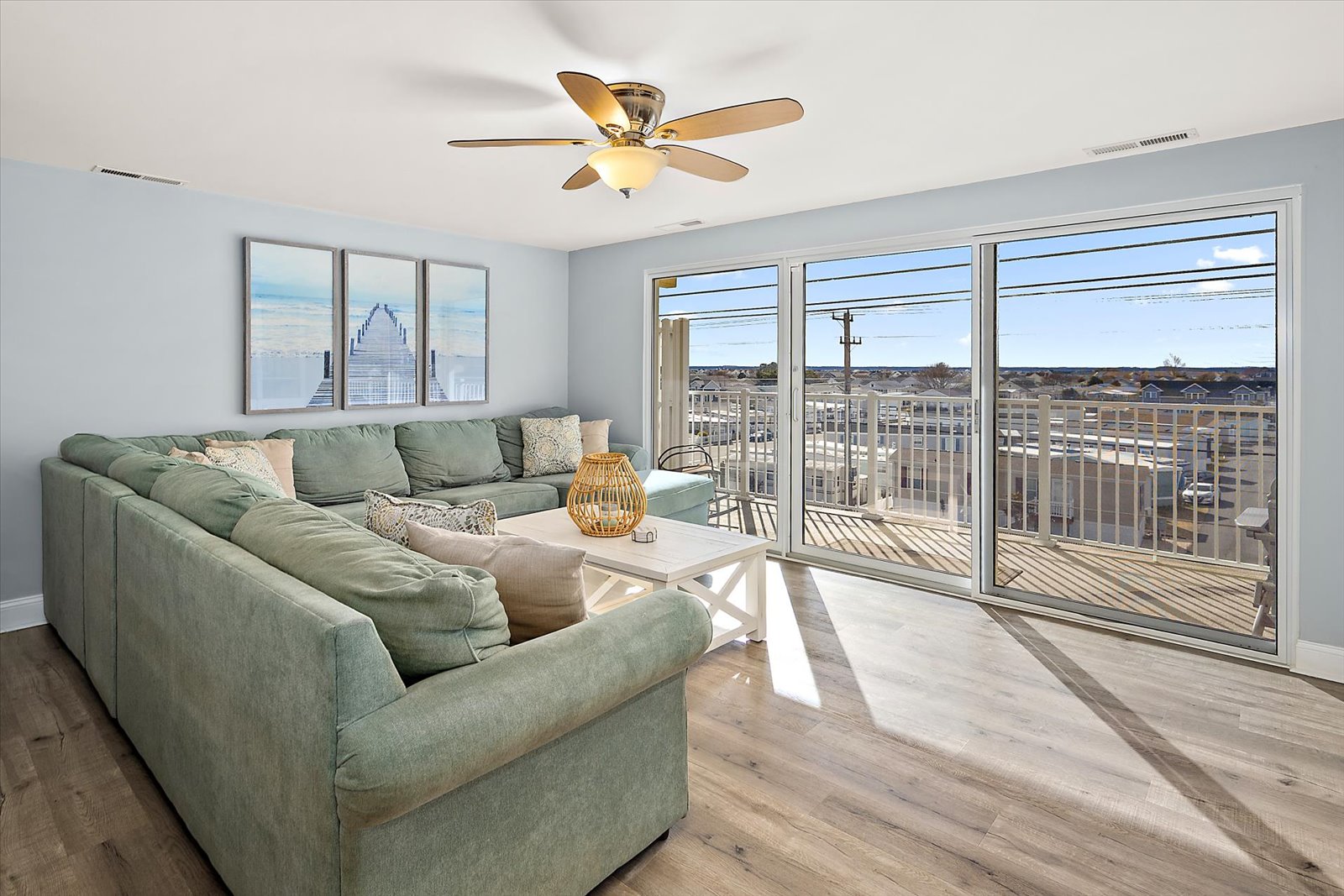 Open-concept living area with plenty of natural light and easy balcony access.