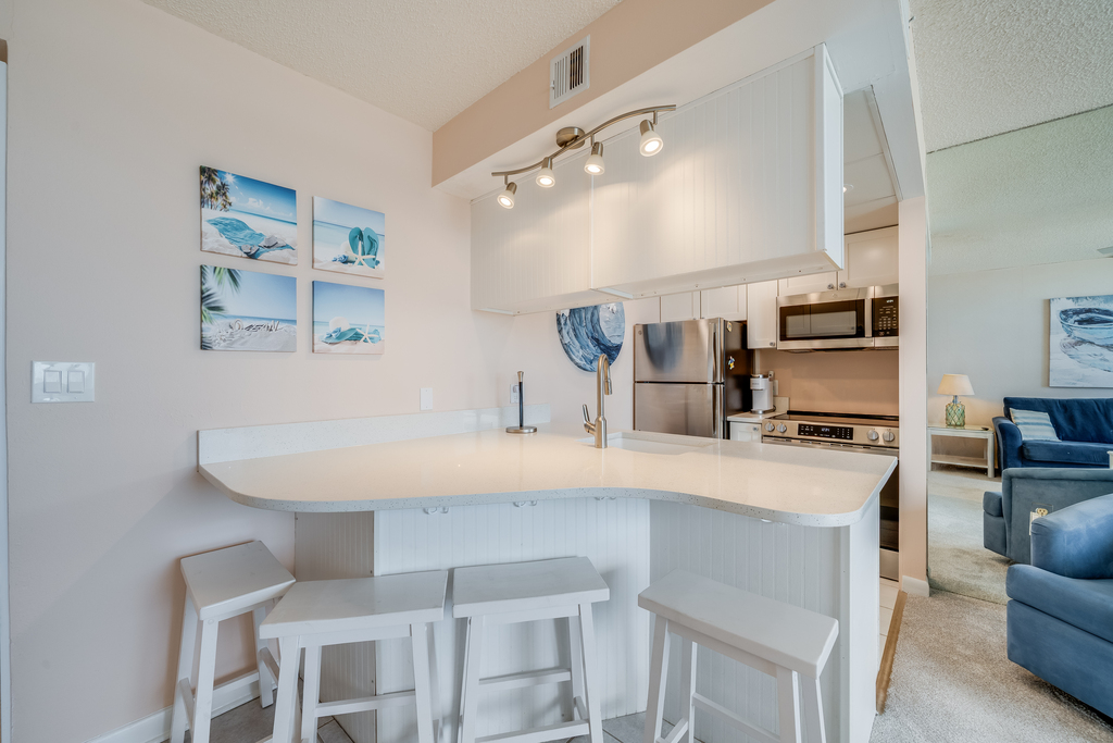 The convenient breakfast bar is the perfect spot for a quick morning bite or chatting with the chef.