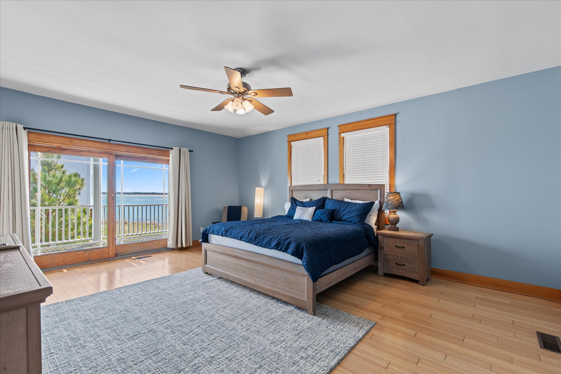 Bedroom 3 is decked out in Nautical Navy and has a King Bed.