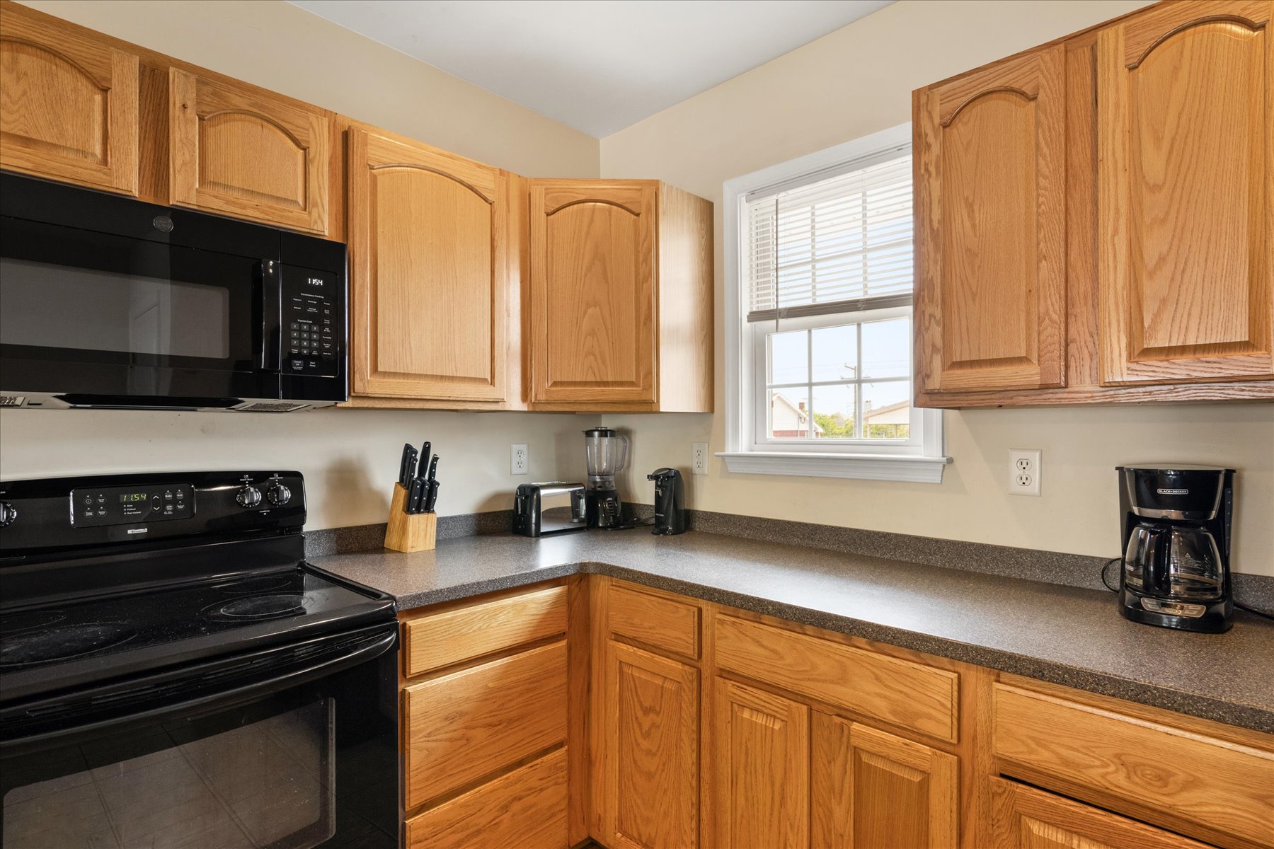 The kitchen is equipped with all the major appliances.