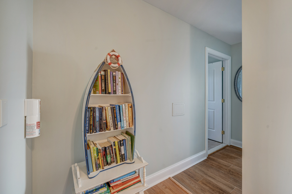 Grab a Book from the adorable Bookshelf on the Landing.