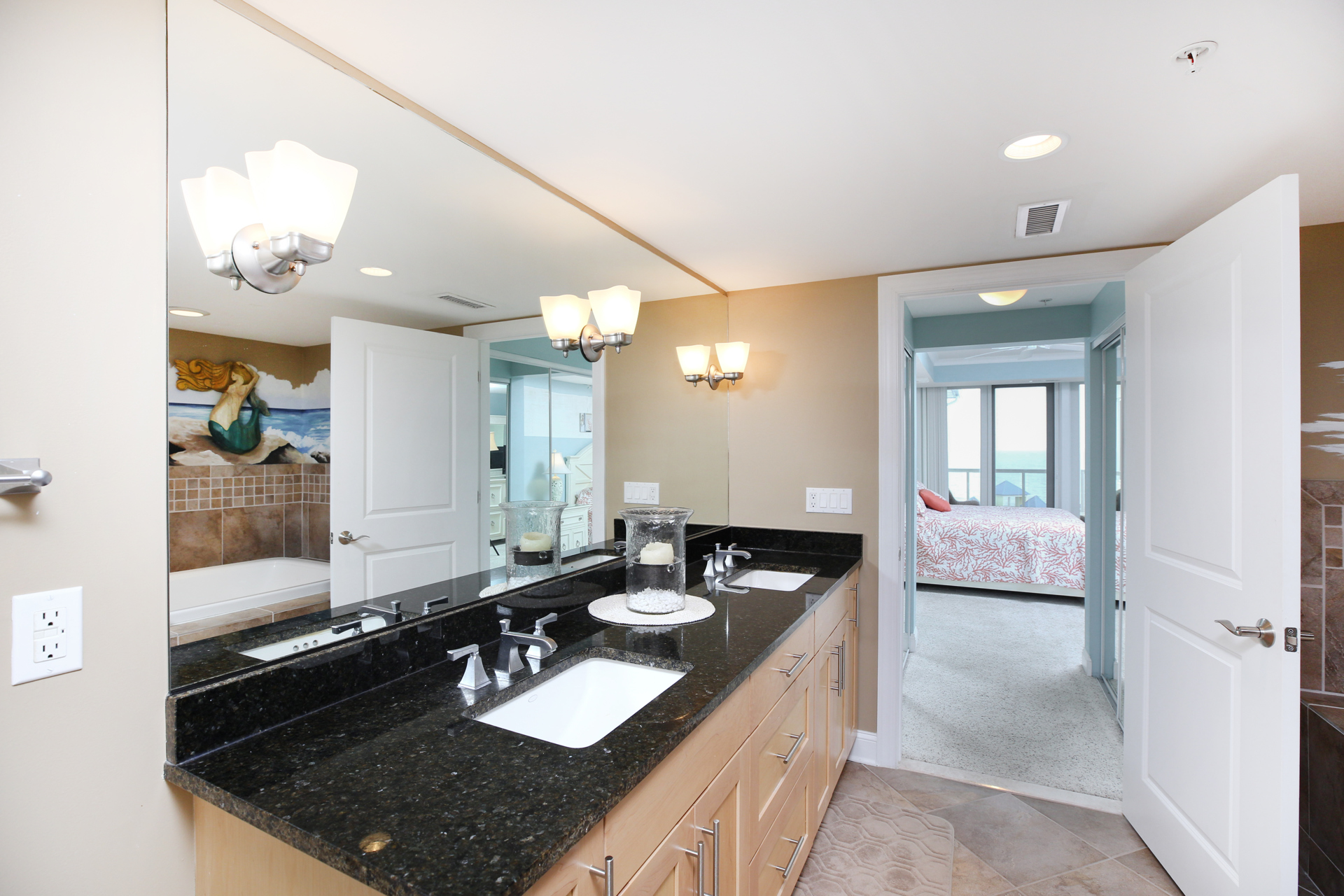 Gleaming Granite and Double Vanity in the Primary Bath.