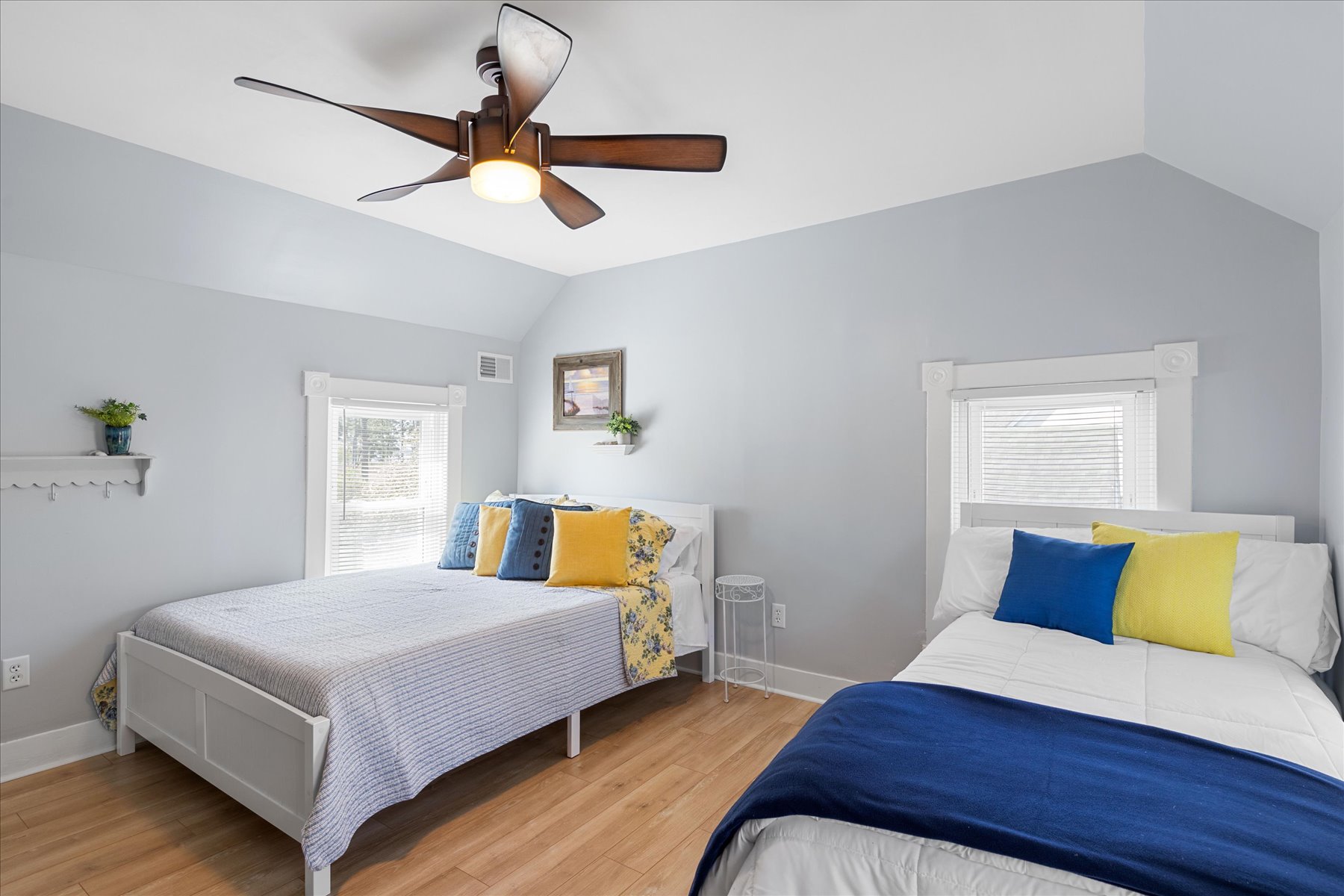 Upstairs, Bedroom 2 sleeps 4 with a Queen Bed, and Twin Bed with Twin Trundle.