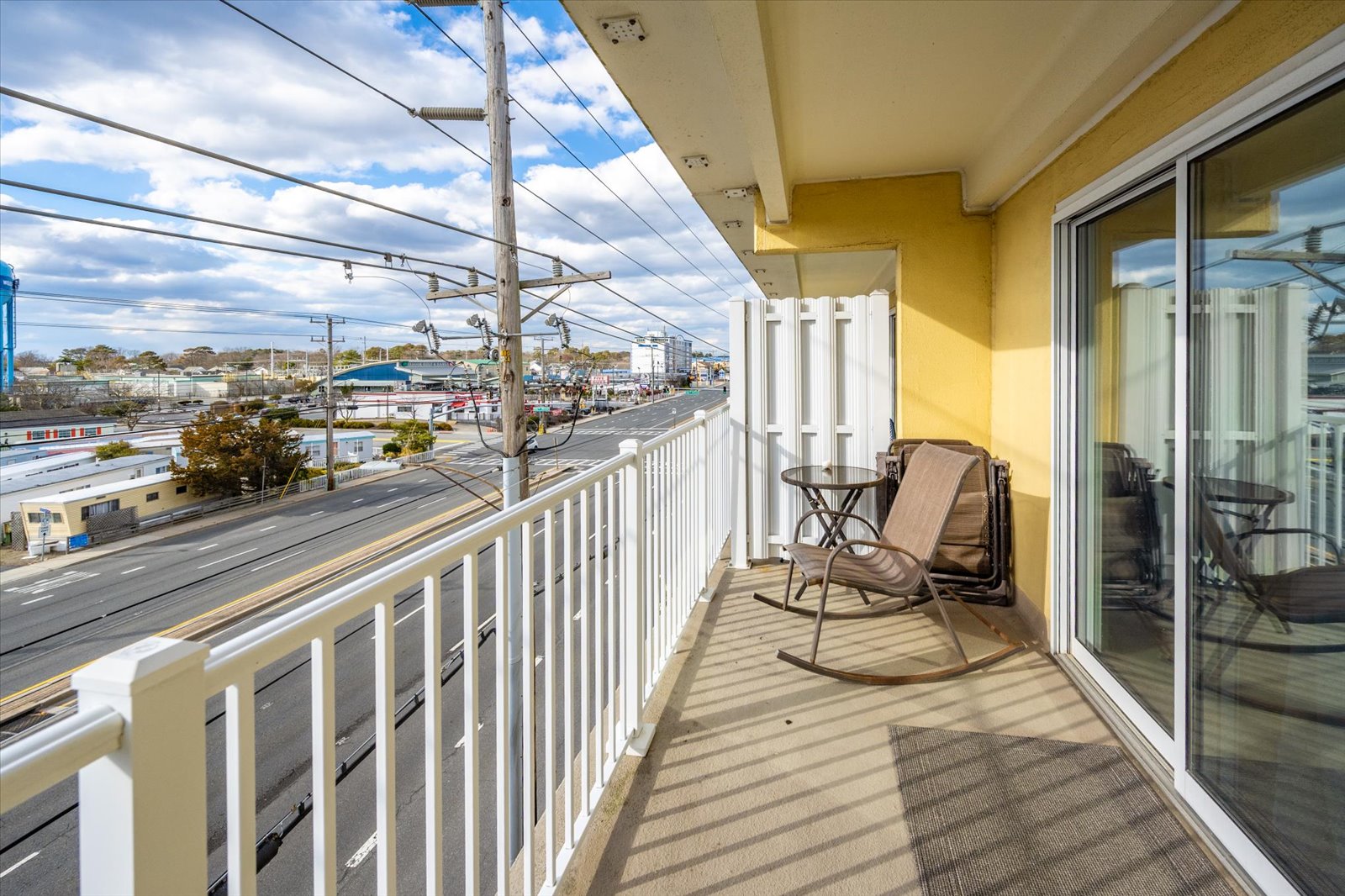 Step outside to your private balcony, complete with seating to enjoy the fresh air and outdoor views!