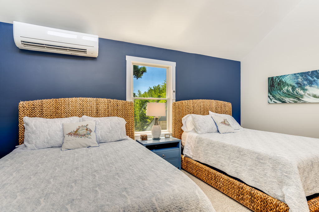 This super cool room has 2 Queen Beds, and a Loft the kids will adore.