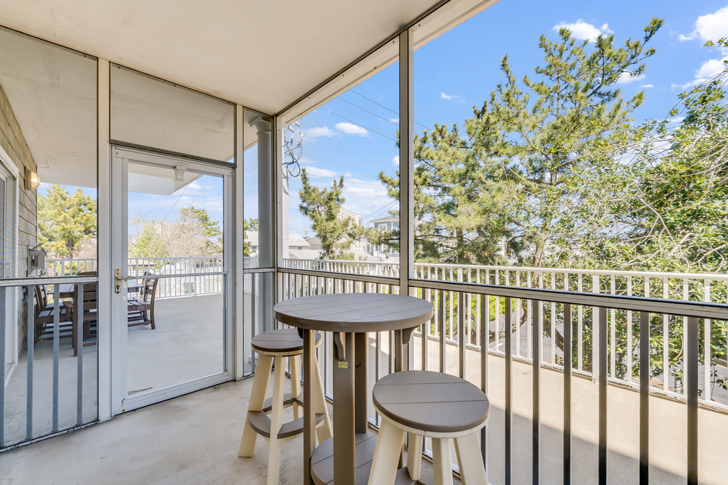 Start your days with coffee in the Screened In Porch