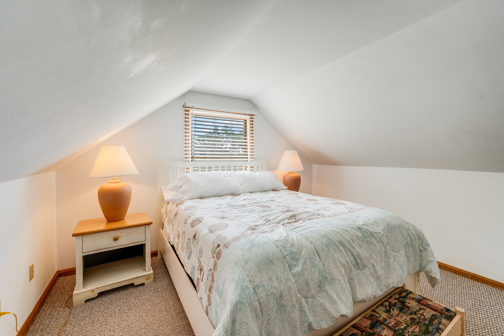 Upstairs, the Master Bedroom has a Queen Bed and lots of Privacy.