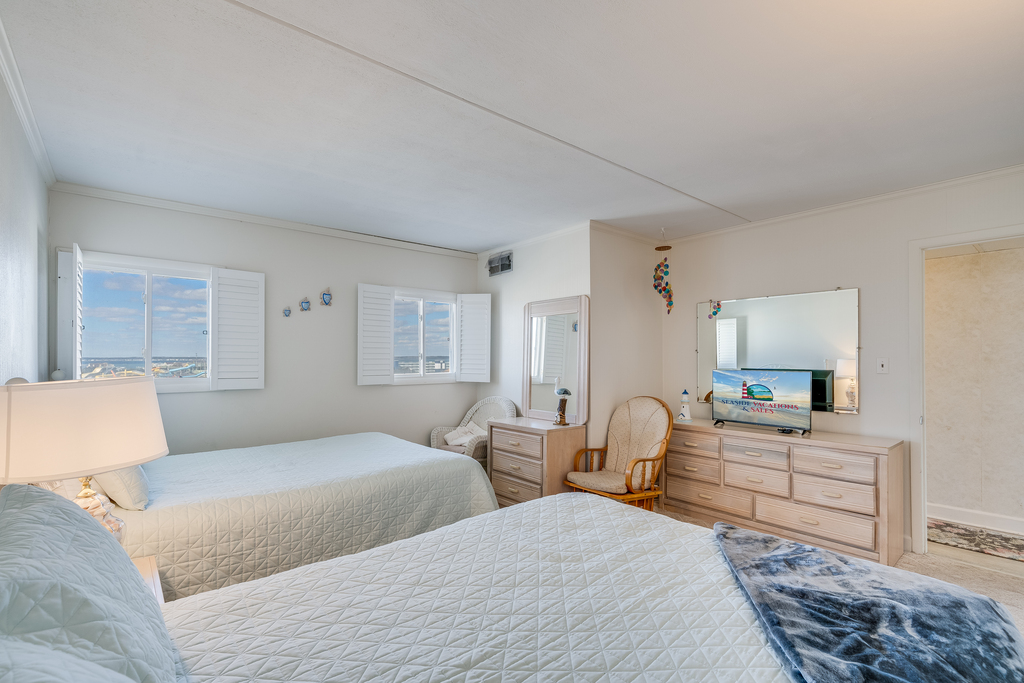 Sink into bed and catch up on your favorite shows on the Flat Screen TV!