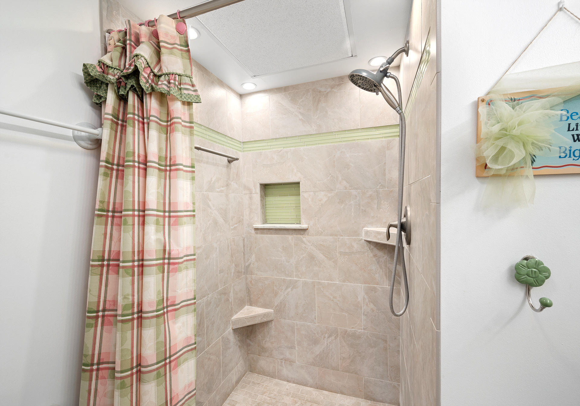 Freshen up before a night out in the town in the Spacious Walk In Shower.