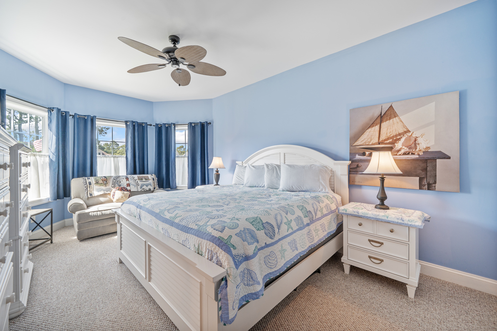 Desirable 1st Floor Primary Bedroom with luxurious King Bed.