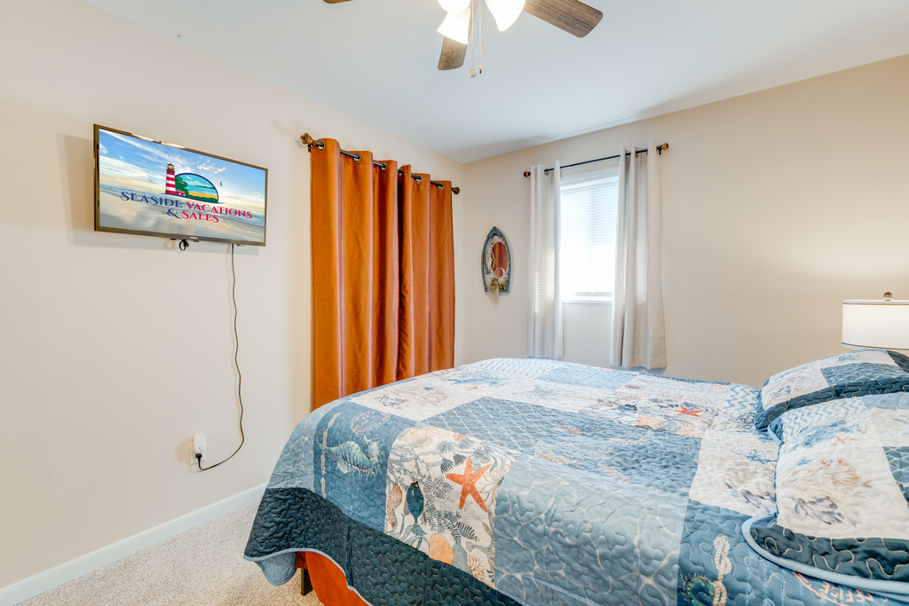 Smart TV and pretty coastal decor.