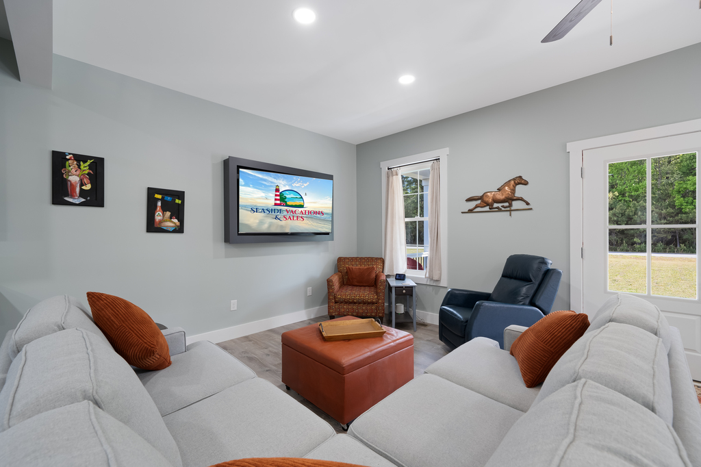 Gorgeous Living Area with comfy furnishings and Flat Screen Smart TV.