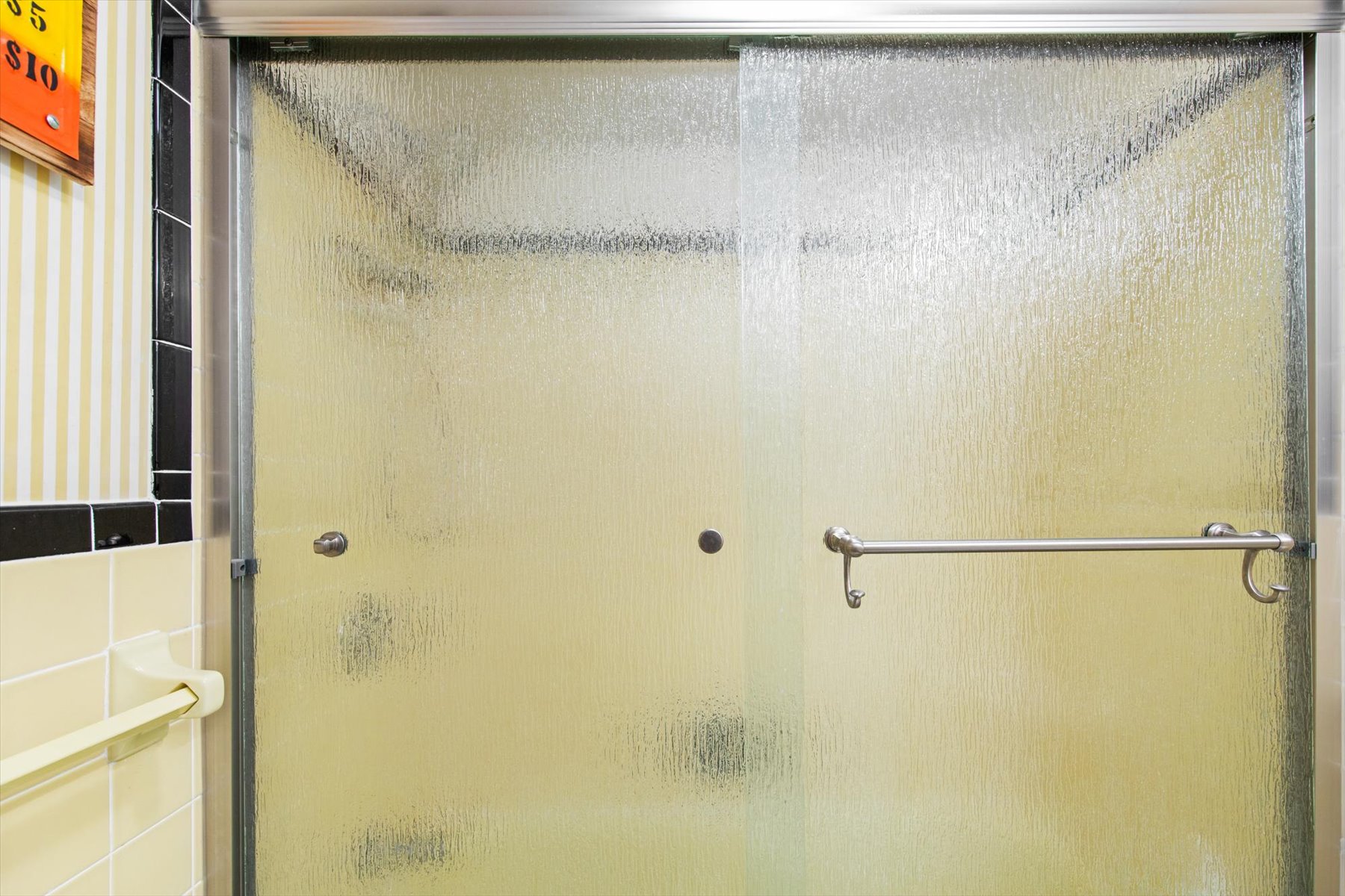 Full bath with shower/tub combo.